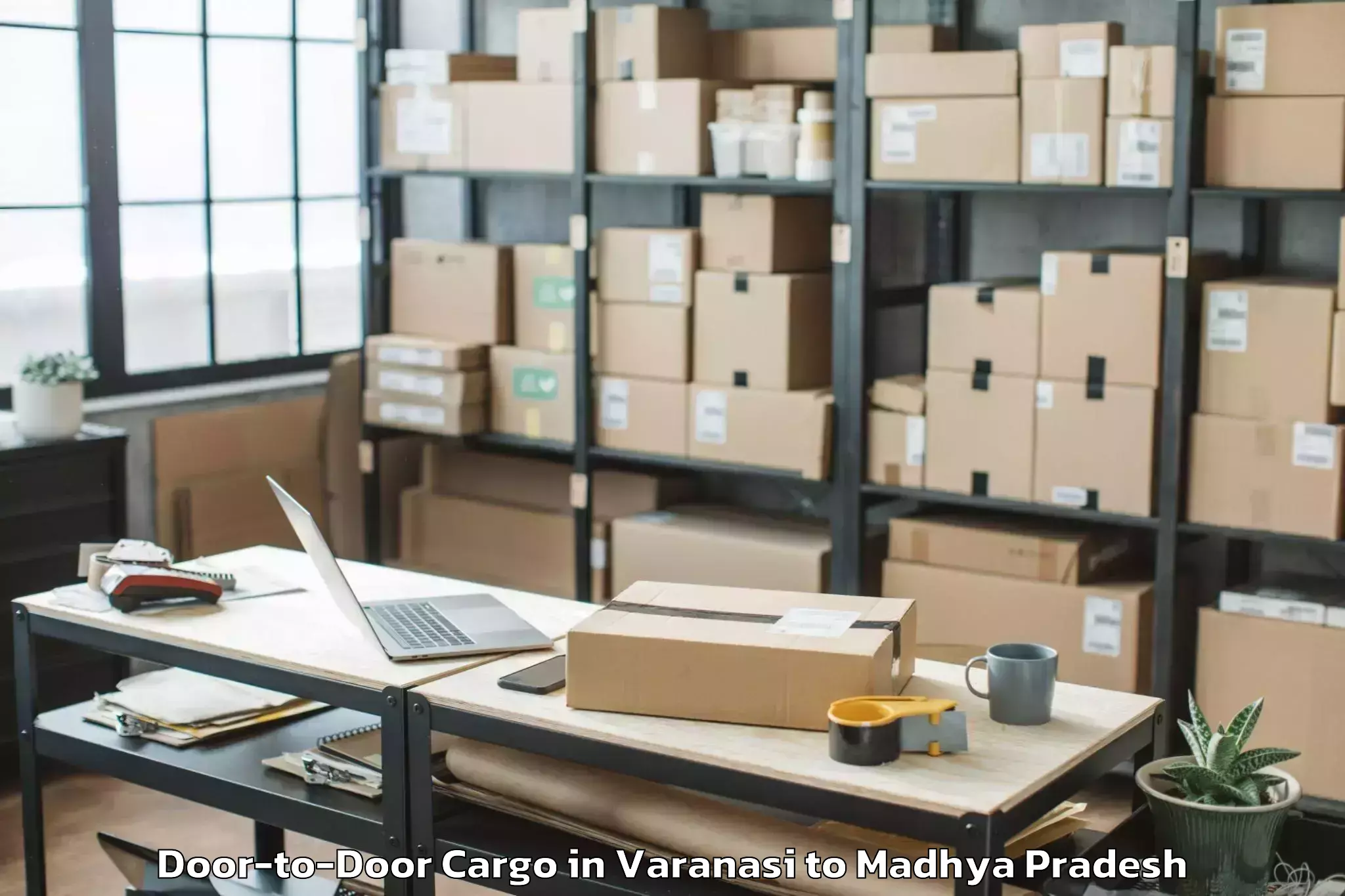 Get Varanasi to Harpalpur Door To Door Cargo